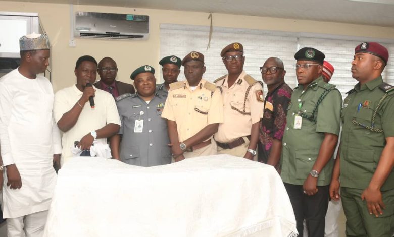 Comptroller Oramalugo Launches 2nd Edition of "Customs Administration in Nigeria" By Lucy Nyambi The Nigeria Customs Service (NCS), Seme Area Command, was the stage for an intellectual milestone on Wednesday, 16 July 2025, as Comptroller Ben Oramalugo, formally launched the second edition of his book, Customs Administration in Nigeria. According to a press release issued by the command's Public Relations Officer, Chief Superintendent of Customs, Isah Sulaiman, the event, which held at the Seme-Krake Joint Border Post, drew senior officials from various security and regulatory agencies, who gathered to celebrate what many described as a “bold contribution to knowledge and professional development” within the Customs and border management community. In his keynote address, Comptroller Oramalugo described the book as more than a publication, "it is a product of years of professional experience, academic research, and policy engagement.” “The dynamism of global trade, the rise of digital customs, and the expanding role of Customs in national security all demand a scholarly response. This book aspires to offer a practical framework for understanding, navigating, and improving customs systems in Nigeria and similar jurisdictions”, he noted. According to him, the second edition incorporates emerging challenges in Customs operations, reflects ongoing reforms under the leadership of the Comptroller-General of Customs, Adewale Adeniyi, and aligns with global standards in trade facilitation and border security. He emphasised the need for Customs officers to embrace continuous intellectual development as a professional ethic. "A knowledgeable officer is a more effective officer. A disciplined mind is a catalyst for institutional excellence." Comptroller Oramalugo also used the opportunity to thank reviewers, editors, and everyone who contributed to the book’s production, while appreciating the support of the CGC and NCS' leadership for promoting a culture of knowledge, discipline and reform. Top officials from the Nigeria Immigration Service, the National Agency for Food, Drug Administration and Control (NAFDAC), and key border stakeholders commended Comptroller Oramalugo for elevating the intellectual dimension of Customs work and praised the transformation underway within the Service, particularly in areas of modernisation, transparency, and professionalism.