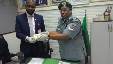 MMIA Customs Hands Over Undeclared Foreign Currency to EFCC Reaffirms Zero Tolerance for False Currency Declaration By Abass Quadri The Nigeria Customs Service (NCS), Muritala Muhammad International Airport (MMIA) Command, has handed over intercepted foreign currencies to the Economic and Financial Crimes Commission (EFCC), reinforcing its uncompromising stance on currency smuggling and false declarations. At a press briefing held on Tuesday, 22 July 2025, the Customs Area Controller, Comptroller Effiong Harrison, disclosed that vigilant operatives under his watch made two separate interceptions at the NIPOST Terminal. He said the first interception involved a parcel containing large volumes of foreign currency from Zimbabwe and Vietnam. “During the examination, we discovered someone was trying to bring excess notes to Nigeria. It is part of our duty to prevent such infractions”, Harrison stated. He revealed that the parcel contained 1.1 trillion Zimbabwean dollars and 1.6 million Vietnamese dong, adding that such large denominations raised suspicions of potential abuse. In the second case, Comptroller Harrison said a passenger attempted to smuggle undeclared cash above the regulatory threshold. “We’ve always advised passengers to declare their funds. We do not tolerate wrong, false or under-declaration, especially above the $10,000 threshold. Note that individuals who don't abide by the directives will be handed over to the appropriate authority", he stated. The seized cash, $14,567, £1,030, and CA$4, along with the suspect’s passport and travel documents, were handed over to the EFCC for further investigation. Receiving the items, Assistant Superintendent I of the EFCC Lagos Zonal Office, Muhammad Adamu, commended Customs for their proactive role in protecting Nigeria’s financial system. "The collaborative spirit we shared has been instrumental in achieving our shared objective." He assured us that further investigation would begin to determine the currency's legitimacy in compliance with our existing law.