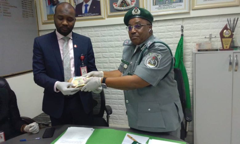 MMIA Customs Hands Over Undeclared Foreign Currency to EFCC Reaffirms Zero Tolerance for False Currency Declaration By Abass Quadri The Nigeria Customs Service (NCS), Muritala Muhammad International Airport (MMIA) Command, has handed over intercepted foreign currencies to the Economic and Financial Crimes Commission (EFCC), reinforcing its uncompromising stance on currency smuggling and false declarations. At a press briefing held on Tuesday, 22 July 2025, the Customs Area Controller, Comptroller Effiong Harrison, disclosed that vigilant operatives under his watch made two separate interceptions at the NIPOST Terminal. He said the first interception involved a parcel containing large volumes of foreign currency from Zimbabwe and Vietnam. “During the examination, we discovered someone was trying to bring excess notes to Nigeria. It is part of our duty to prevent such infractions”, Harrison stated. He revealed that the parcel contained 1.1 trillion Zimbabwean dollars and 1.6 million Vietnamese dong, adding that such large denominations raised suspicions of potential abuse. In the second case, Comptroller Harrison said a passenger attempted to smuggle undeclared cash above the regulatory threshold. “We’ve always advised passengers to declare their funds. We do not tolerate wrong, false or under-declaration, especially above the $10,000 threshold. Note that individuals who don't abide by the directives will be handed over to the appropriate authority", he stated. The seized cash, $14,567, £1,030, and CA$4, along with the suspect’s passport and travel documents, were handed over to the EFCC for further investigation. Receiving the items, Assistant Superintendent I of the EFCC Lagos Zonal Office, Muhammad Adamu, commended Customs for their proactive role in protecting Nigeria’s financial system. "The collaborative spirit we shared has been instrumental in achieving our shared objective." He assured us that further investigation would begin to determine the currency's legitimacy in compliance with our existing law.