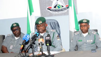 Port-Harcourt II Area Command Records Historic Revenue Performance, Intensifies Smuggling Effort By Bimpe Audu The Nigeria Customs Service (NCS), Port Harcourt II Area Command, Onne, has recorded what authorities described as an unprecedented revenue performance, while also tightening its grip on smuggling activities along the nation’s Eastern maritime corridor. Addressing journalists during a press briefing in Onne on Thursday, 14 May 2026, the Customs Area Controller, Comptroller Aliyu Alkali, outlined the Command’s major achievements in revenue generation and anti-smuggling operations at the port. According to Comptroller Alkali, the Command generated over ₦77.3 billion in April 2026 alone, the highest monthly revenue collection ever recorded since the Command's establishment. He further disclosed that between January and April 2026, the Command generated a total of ₦258.2 billion, describing the figure as a landmark achievement in the Command's history. “This unprecedented revenue performance reflects the commitment of the Command to blocking leakages, facilitating legitimate trade, and ensuring full compliance with government fiscal policies. Our officers have remained resolute and professional in carrying out this mandate,” he said. Beyond revenue generation, the Command also uncovered several sophisticated smuggling attempts during the review period, exposing what he described as desperate tactics by some importers and agents to evade Customs duties. According to him, one such interception occurred in February 2026, when Customs officers uncovered a 40-foot container falsely declared as containing plumbing materials. Investigations later revealed that the original container identification number had allegedly been tampered with and replaced in an attempt to smuggle the cargo out of the port without paying the appropriate duties. The seized container had a Duty Paid Value (DPV) of ₦185.2 million. In another operation during the same month, officers intercepted nine additional 40-foot containers loaded with assorted goods, including fabrics, garments, LED lights, solar fans, building materials, and carpentry tools. The containers, with a combined DPV of over ₦1.25 billion, were reportedly linked to violations involving falsification of import documents, alteration of marks and numbers, and attempted evasion of Customs duties. The anti-smuggling drive continued in April when the Command intercepted six 20-foot containers carrying 1,100 jerricans of Super Delicieux Vegetable Oil valued at ₦494 million. Alkali explained that the importation contravened Section 55 of the Nigeria Customs Service Act, 2023, which restricts the importation of refined vegetable oils to encourage local production and protect indigenous manufacturers. Also seized was a 40-foot container concealing about 600 cartons of unregistered Hyergra drugs hidden among ceiling fans, chilly cutters, and food packs. The illicit pharmaceutical products and other concealed items carried an estimated DPV of ₦139.3 million. Altogether, the Command recorded seizures involving 17 containers with a cumulative Duty Paid Value of over ₦2.06 billion during the review period. “We want to send a strong warning to all importers and agents involved in unlawful activities that the Nigeria Customs Service will not relent in its fight against smuggling and other illegal trade practices. Our surveillance and enforcement mechanisms remain active and effective, and anyone attempting to circumvent the law will face the full consequences,” he warned. He, however, encouraged compliant traders to continue conducting legitimate business in line with extant laws and import regulations. Alkali commended the Comptroller-General of Customs, Adewale Adeniyi, for providing strategic leadership and institutional support that continues to enhance operational efficiency across Commands nationwide. He further praised officers and men of the Port Harcourt II Area Command for their vigilance, professionalism, and resilience, noting that their commitment remains central to the Command’s successes. The briefing ended with appreciation for the media's sustained public awareness of the Service's activities and operations.