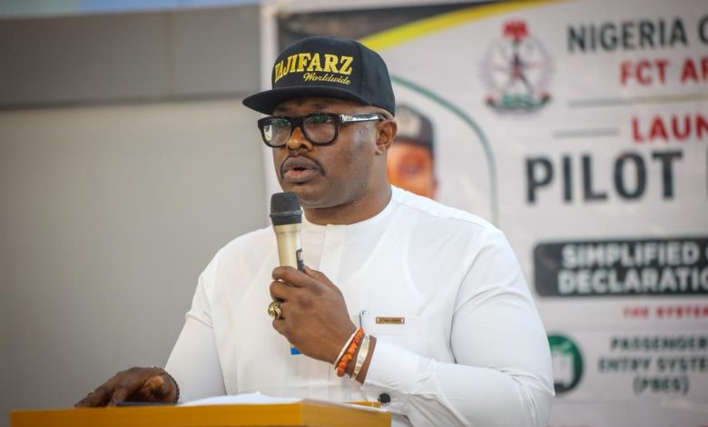 Customs Launches Smart Declaration Platform to End Airport Delays By Muhammad Bashir The Nigeria Customs Service (NCS), on Monday, 18 May 2026, officially launched the Simplified Customs Advanced Declaration System (SCADS) at the International Wing of the Nnamdi Azikiwe International Airport, Abuja, in a move aimed at improving passenger clearance, compliance and Customs operations. The platform, designed to simplify baggage declaration for inbound international passengers, is expected to reduce manual bottlenecks, improve transparency in revenue assessment and enhance operational efficiency at Nigeria’s international airports. Speaking at the official launch, the Deputy Comptroller-General of Customs in charge of ICT/Modernisation, Oluyomi Adebakin, said the deployment marks another major step in the Service’s digital transformation agenda under the leadership of the Comptroller-General of Customs, Adewale Adeniyi. DCG Adebakin said the initiative became necessary following operational challenges encountered on the Service’s previous passenger declaration platform earlier this year, stressing that, rather than allow the setbacks to slow operations, the Service chose to develop a stronger, more efficient alternative. “When the earlier platform experienced operational challenges, we chose not to see it as a setback. We saw it as an opportunity to build something better, stronger and more efficient,” she said. According to her, the newly introduced SCADS platform allows passengers to declare items before arrival, thereby reducing clearance time while improving compliance and operational integrity. “For passengers, this system creates the opportunity for advance declaration before arrival. It means faster clearance, easier compliance and smoother movement through our airports,” she added. The DCG further explained that the system will eliminate subjective revenue assessment by ensuring that duties are automatically generated based on declared items, their quantities, and their actual values. “When we talk about revenue collection, it is not about collecting more or less. It is about collecting the right revenue. With this system, assessment will now be more objective, accurate and driven by data,” she stated. She commended officers of the Non-Intrusive Inspection Unit, members of the deployment team and technical partners whose efforts made the pilot rollout possible. Earlier, the Customs Area Controller, FCT Area Command, Comptroller Victoria Alibo, described the selection of the Command for the pilot phase as a vote of confidence in its operational capacity. She said the new platform integrates passenger baggage and e-commerce declarations into a single digital framework designed to support global Customs best practices. “SCADS is designed to simplify declarations, reduce clearance time, eliminate manual bottlenecks and align our operations with international standards,” Comptroller Alibo said. She disclosed that the pilot phase will run for five days, from Monday, 18 May to Friday, 22 May 2026, during which officers will evaluate the system in a live environment ahead of nationwide deployment. The pilot launch of SCADS was attended by senior Customs officers, officials of the Federal Airports Authority of Nigeria, partner government agencies, technical teams and other key stakeholders in Nigeria’s aviation and border management ecosystem.