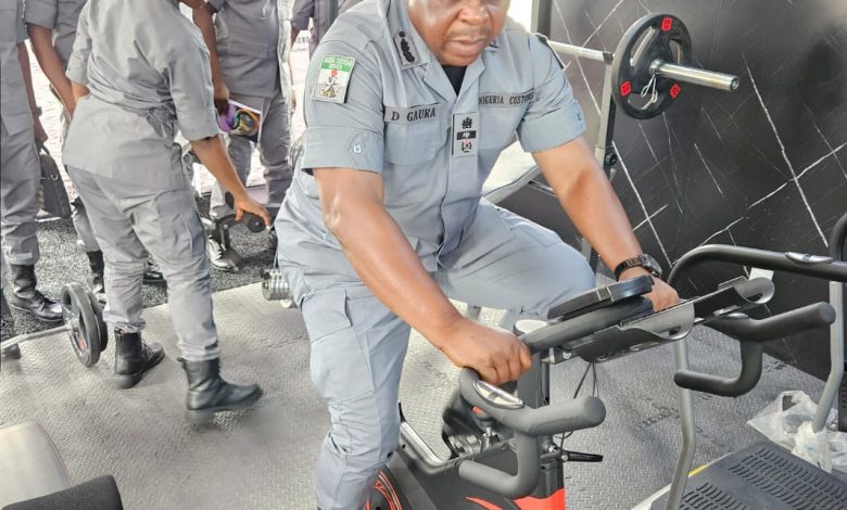 Customs Unveils Fitness Hub After Inter-Agency Games in Kaduna By Bimpe Audu The Nigeria Customs Service (NCS), Kaduna Area Command, on Thursday, 23 July 2026, commissioned the SG Hassan Fitness Hub following an Inter-Agency Games organised to promote physical fitness, teamwork and stronger collaboration among security agencies in Kaduna State. The sporting event featured football, basketball, volleyball and badminton, bringing together personnel of the Nigeria Customs Service, Nigeria Police Force, National Drug Law Enforcement Agency (NDLEA), Nigerian Army and Nigeria Immigration Service. Speaking at the commissioning, the Customs Area Controller, Comptroller Sa’ad Hassan, said the fitness hub was established to encourage regular exercise, recreation and healthy living among officers of the Command and personnel of other participating agencies. “The facility is designed to promote physical fitness, recreation and wellness. It will also provide a dedicated space for training and help sustain the gains of our inter-agency sporting engagements,” he said. Representatives of the participating agencies commended the initiative, describing it as timely and beneficial. They said the facility would strengthen existing partnerships, encourage healthy interaction and further enhance cooperation among sister security agencies in Kaduna State. The event concluded with the formal unveiling of the SG Hassan Fitness Hub, underscoring the participating agencies’ shared commitment to promoting physical fitness, operational readiness and sustained inter-agency collaboration.